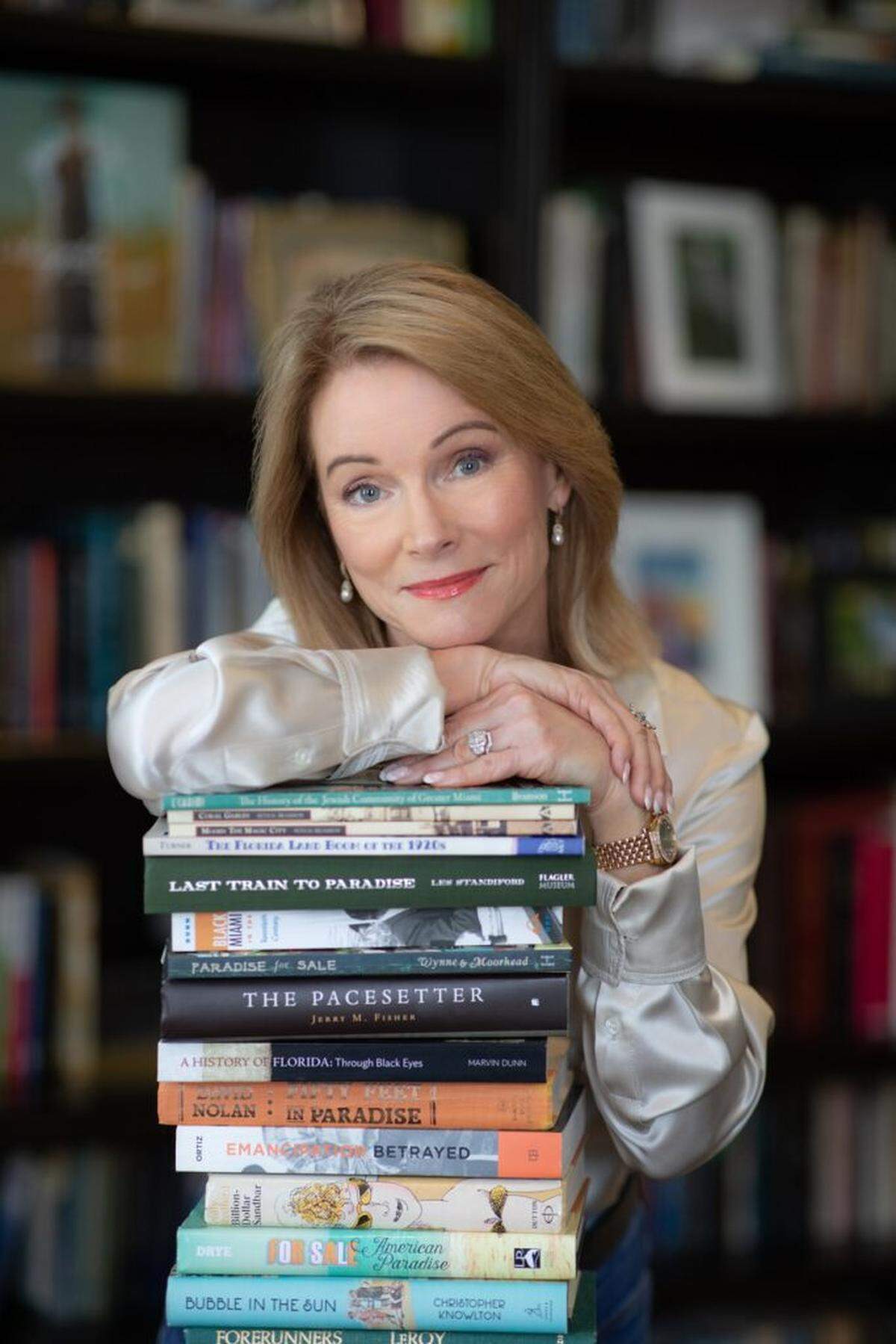 Author June Thomson Morris spent nearly one year of researching Florida history before writing herplay, “Greetings From Paradise.”