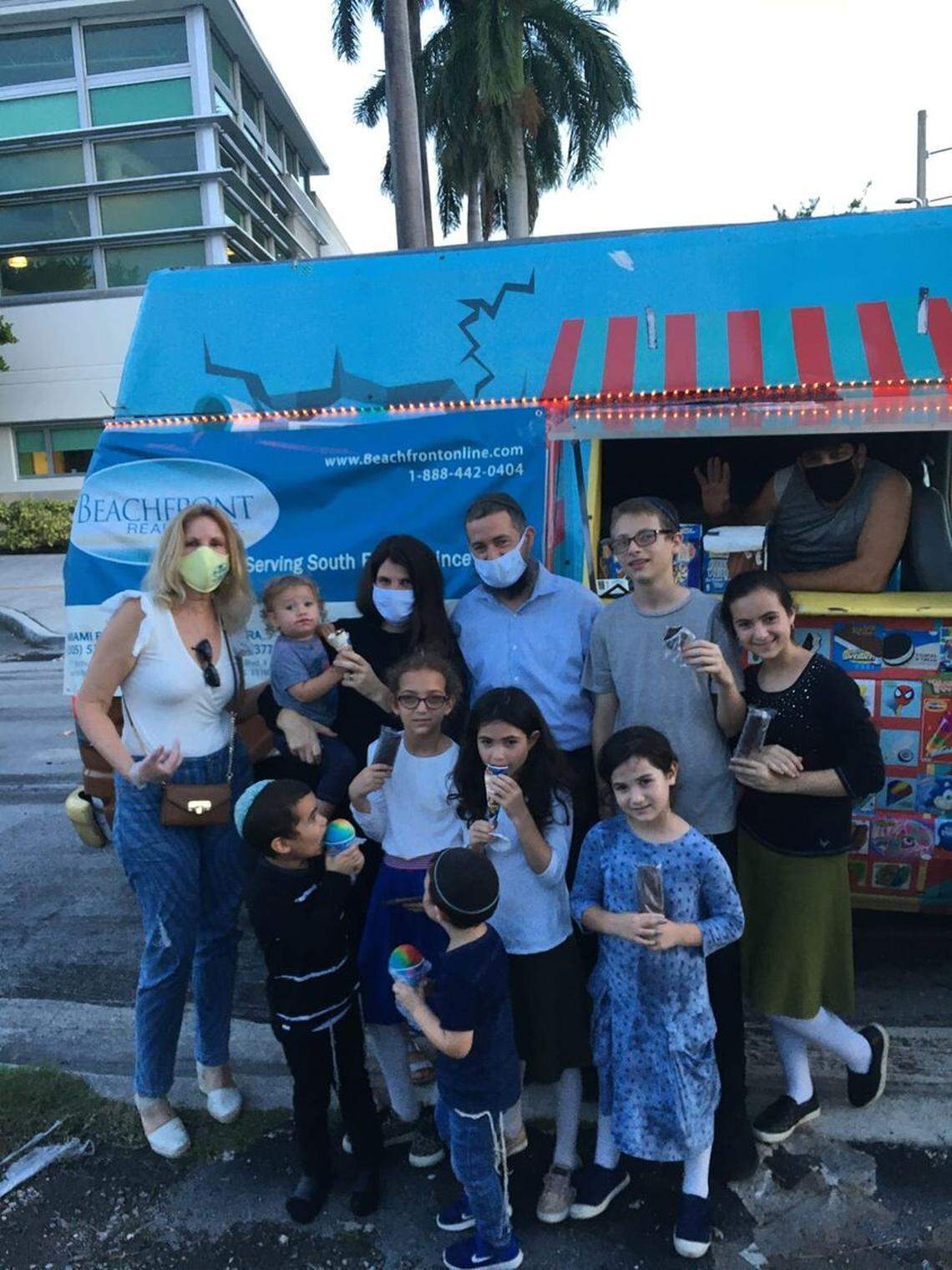 Realtor Mona Heisler treats children in Highland Lakes to free ice cream.