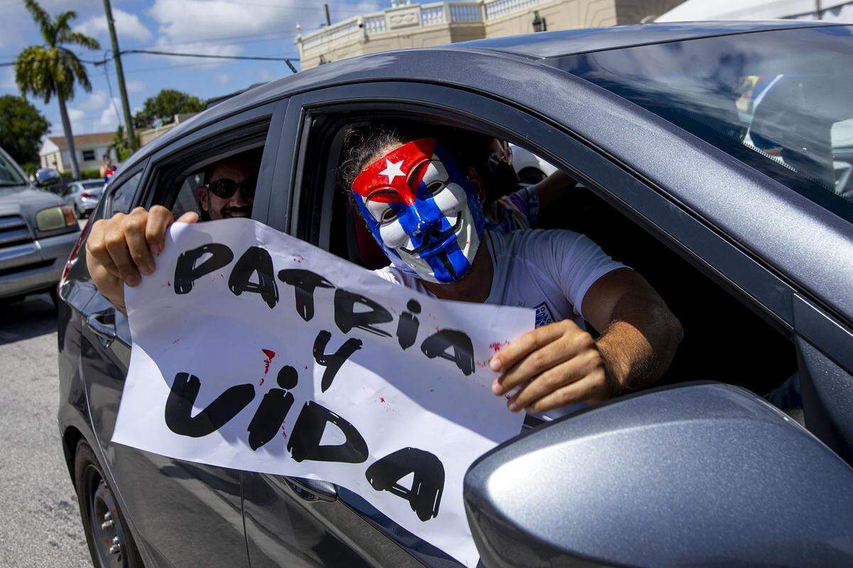 Thousands of Miamians show their support near Little Havana Sunday for anti-government protests in Cuba.