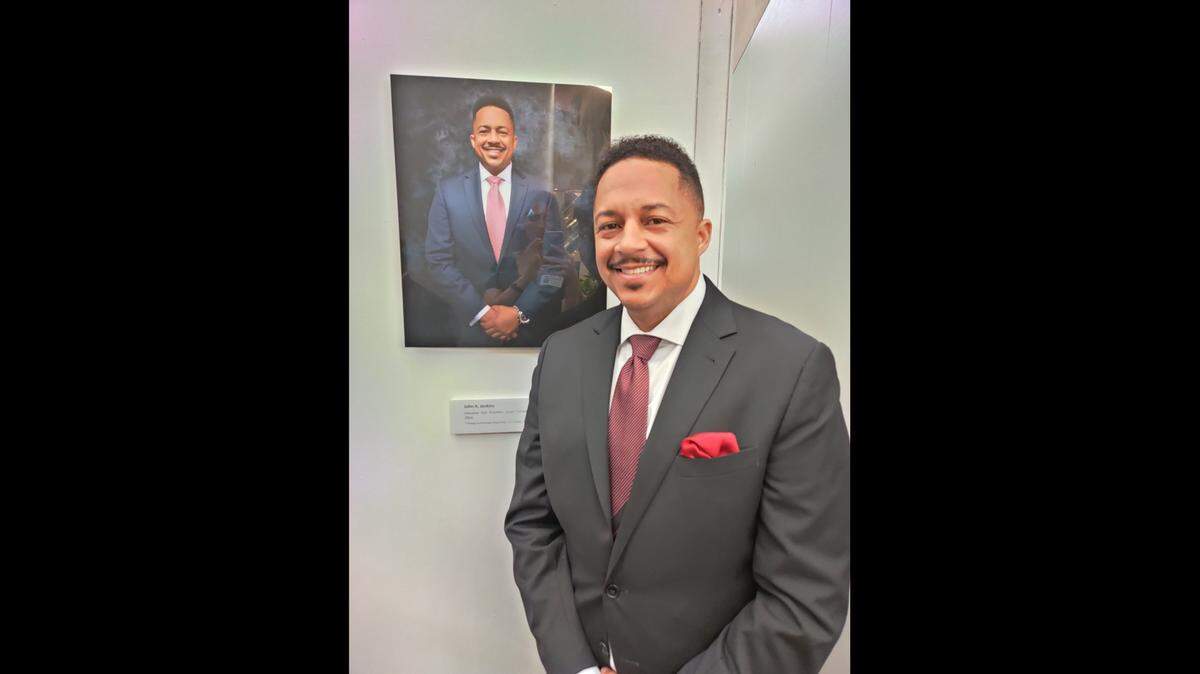 Former South Florida Police Benevolent Association Executive Vice President John Jenkins, pictured here at the Stephen P. Clark Government Center in February 2020. His portrait was featured in an exhibit honoring African-American leaders in Miami-Dade County.