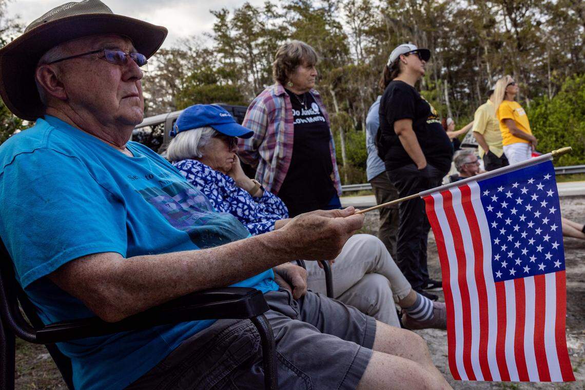 People from different religious denominations hold vigil outside Alligator Alcatraz on Sunday, October 19, 2025, in Ochopee, Fla.