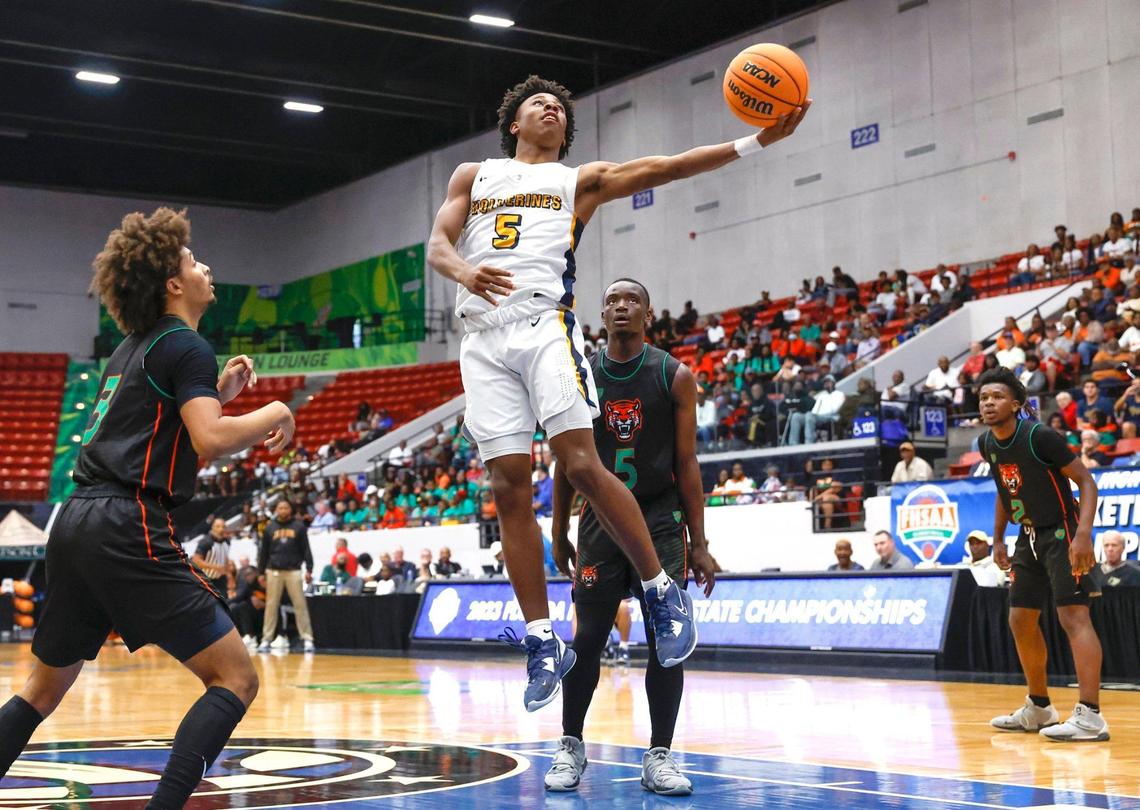 Belen Jesuit Prep Bryce Fitzgerald (5) attempts to score against Jones High School defenders in the third quarter in the FHSAA 5A State Semifinals at the RP Funding Center in Lakeland, Florida on Thursday, March 2, 2023.