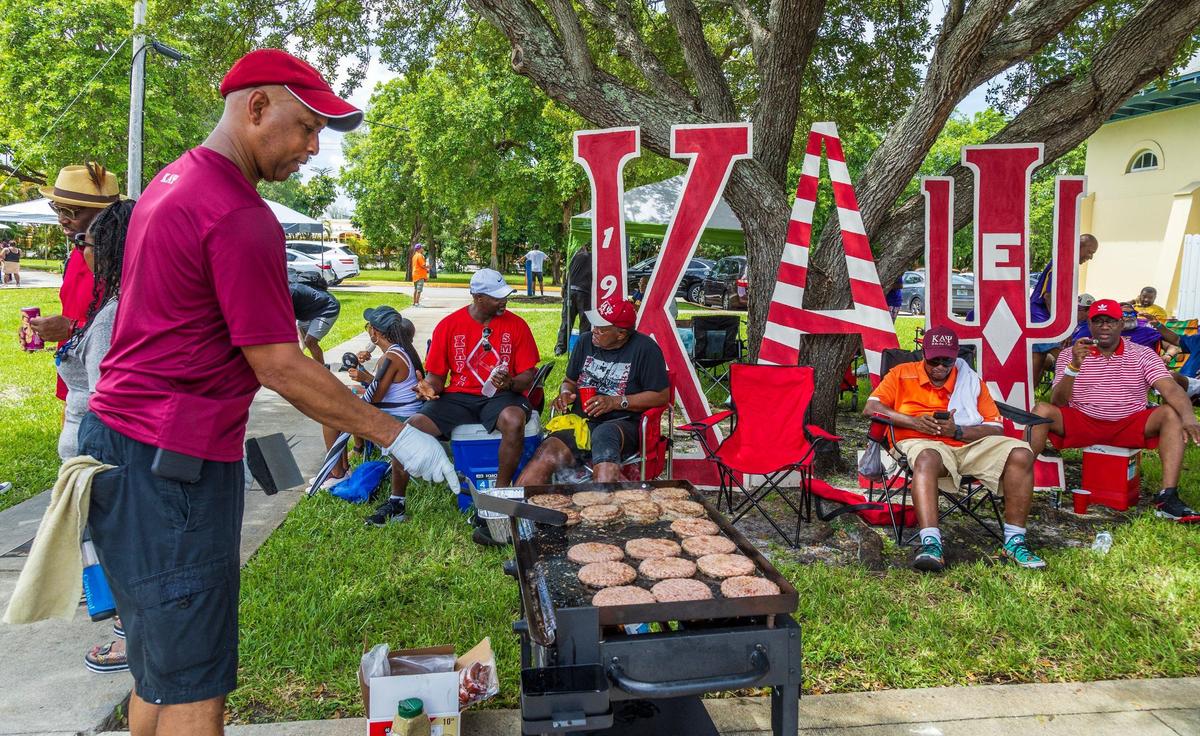 Oliver Spicer, FMU alumni and member of Kappa Alpha Psi Fraternity, Inc. grills some burgers during the 8th Annual South Florida HBCU Picnic.