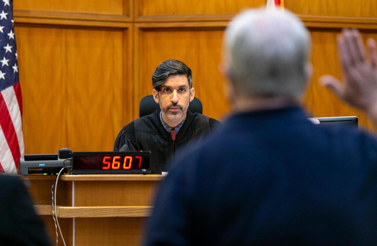 Tom Privett is sworn in by Judge Ramiro Areces during Privett’s sentencing hearing at the Richard E. Gerstein Justice Building in Miami on Wednesday, Nov. 17, 2021. Privett, a retired South Dade government teacher, pleaded guilty to raping an underaged student.