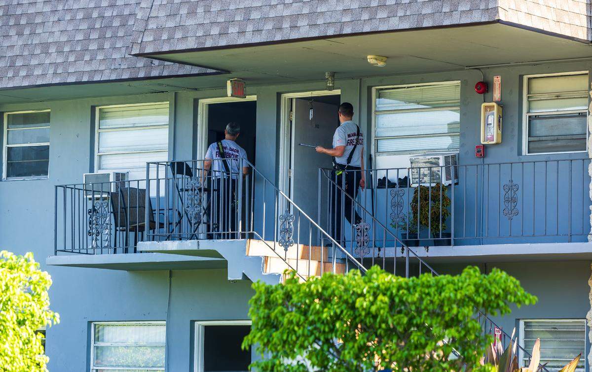 Miami-Dade Fire Rescue checks the units at the Hemingway Villa Condominiums, 9375 SW 40th Terrace, after a water heater leaked carbon monoxide early Tuesday morning, June 4, 2024. More than 20 people were transported to local hospitals and checked for carbon monoxide poisoning.