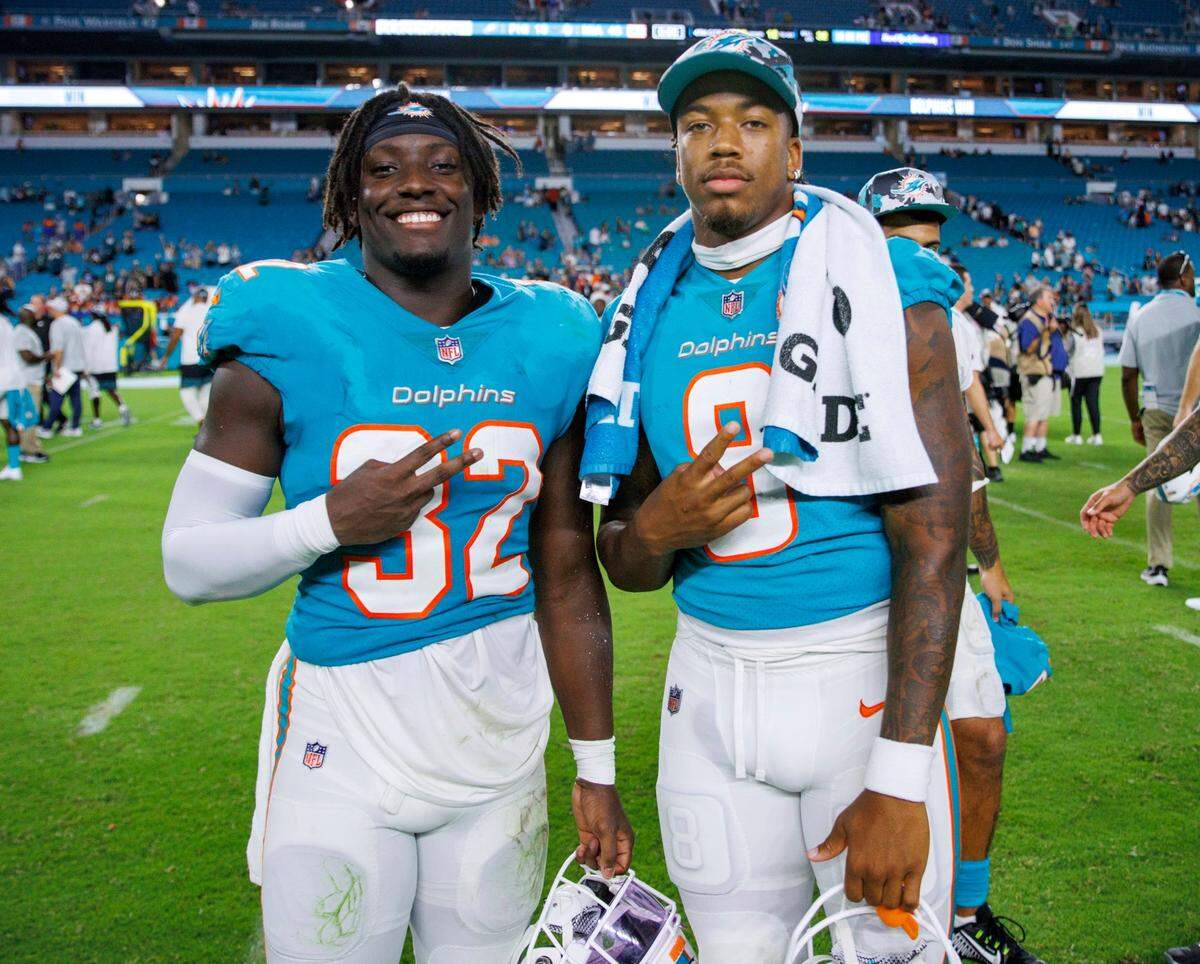 Miami Dolphins safeties Verone McKinley III (32) and Jevon Holland (8) poses for the picture after their 48-10 win over the Philadelphia Eagles during an NFL preseason football game at Hard Rock Stadium on Aug. 27, 2022 in Miami Gardens, Florida.