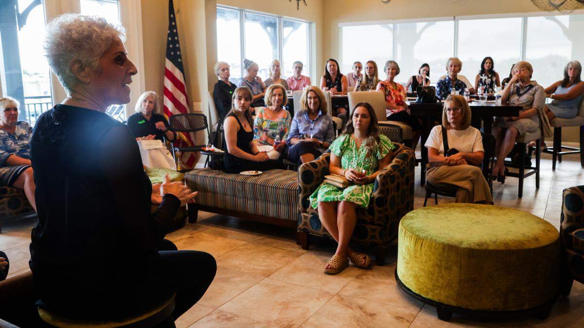 Dr. Marion Pandiscio, an obstetrician-gynecologist, in front on left, as she addresses a group of about 40 Republican women to talk about their support for Amendment 4 on Aug. 27, 2024, in Bradenton.