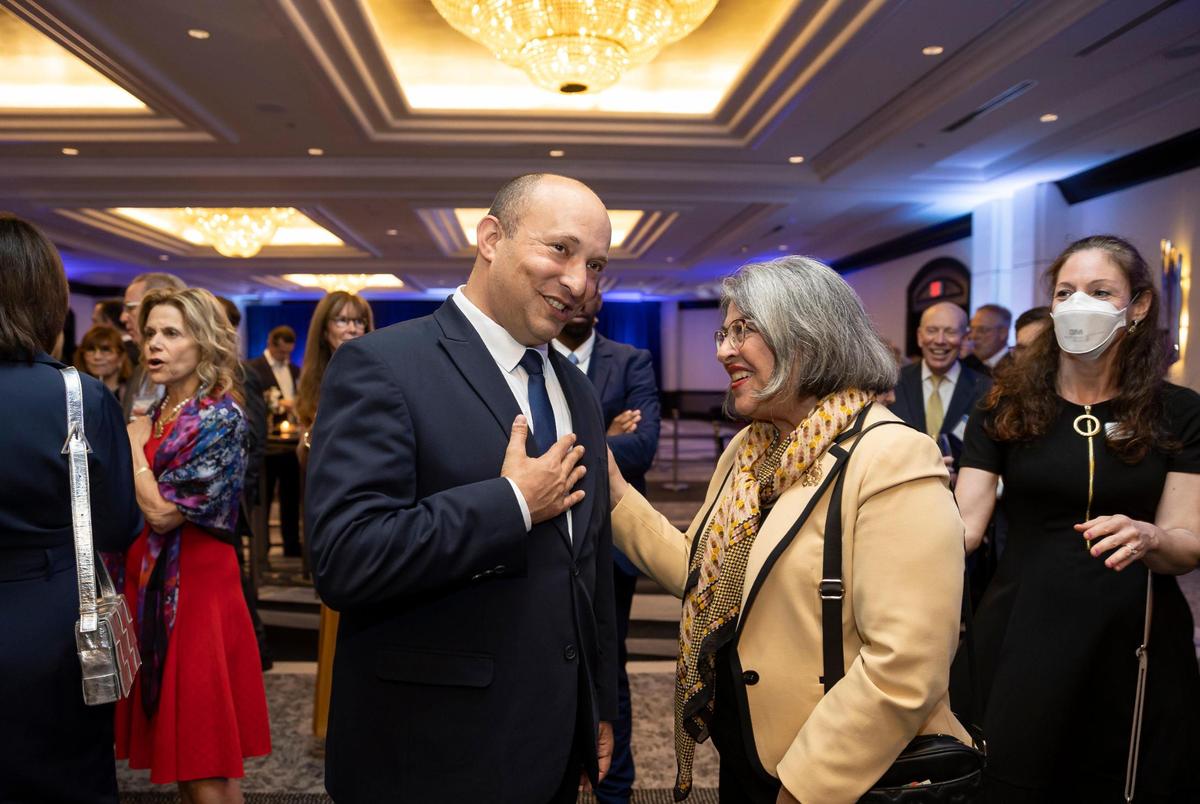 Naftali Bennett, who served as Israel’s 13th prime minister, speaks with Miami-Dade County Mayor Daniella Levine Cava before the start of the Greater Miami Jewish Federation’s The Main Event at the Loews Hotel on Monday, Feb. 20, 2023, in Miami Beach, Florida.