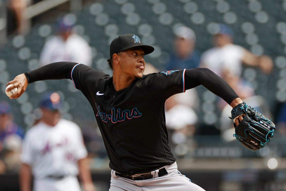 Miami Marlins pitcher Elieser Hernandez delivers a pitch during the first inning of the first game of a baseball doubleheader against the New York Mets that started April 11 and was suspended because of rain, Tuesday, Aug. 31, 2021, in New York.