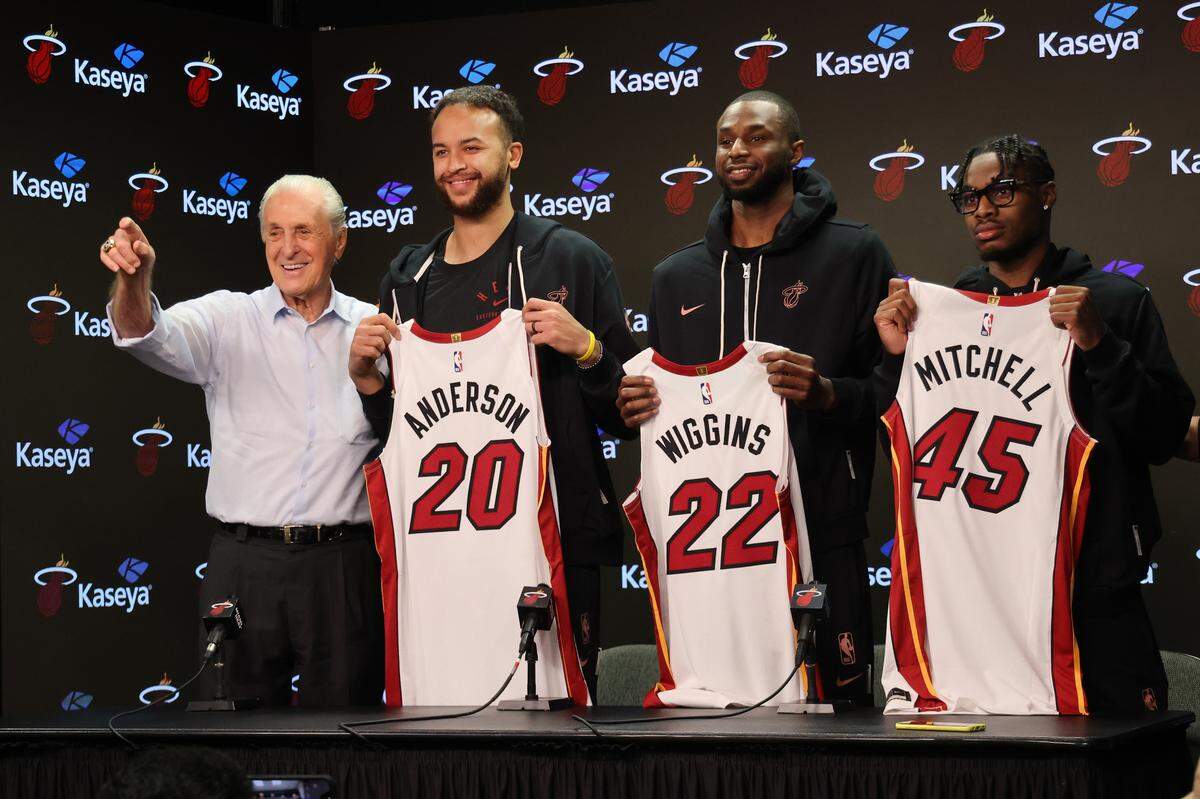 Miami Heat President Pat Riley pose with the team’s newest members forward Kyle Anderson (20), forward Andrew Wiggins (22), and point guard Davion Mitchell (45) during their introductory press conference at Kaseya Center in Miami, Florida, on Sunday, Feb. 9, 2025.