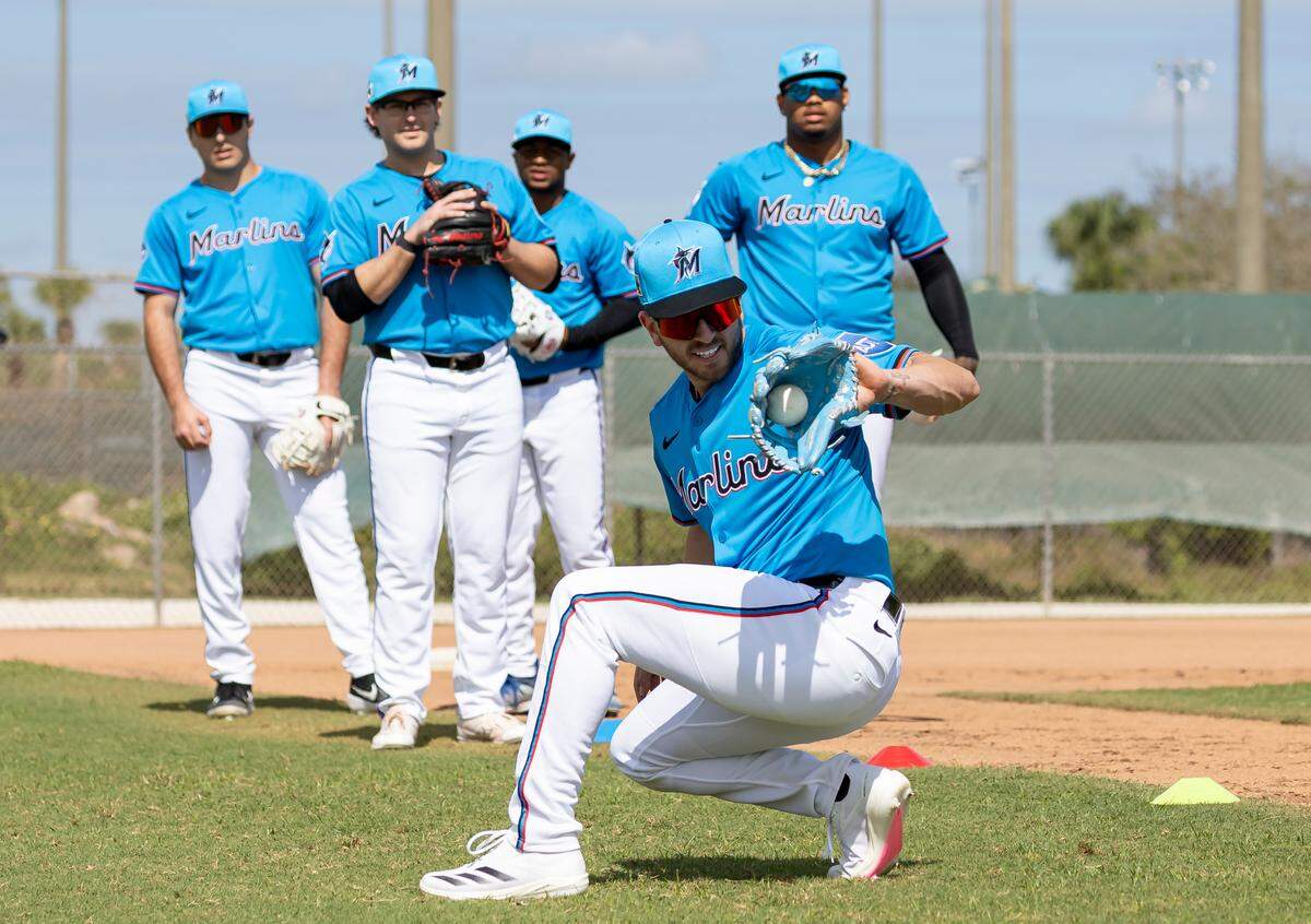 Miami Marlins third base Connor Norby (1) catches the ball during first full-squad spring training workouts at Roger Dean Chevrolet Stadium on Monday, Feb. 17, 2025, in Jupiter, Fla.
