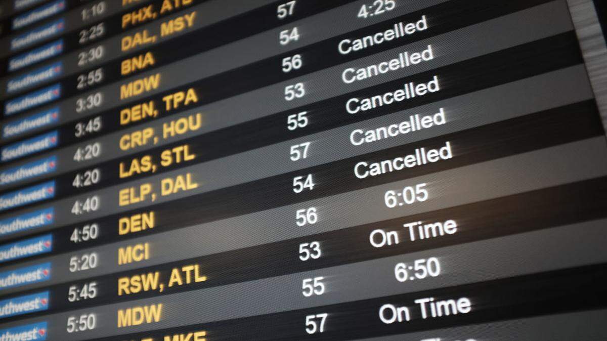 NEW YORK, NEW YORK - JANUARY 25: A departures board shows cancelled flights at LaGuardia Airport after the Federal Aviation Administration (FAA) announced it is delaying flights into multiple airports due to staffing concerns related the government shutdown on January 25, 2019 in the Queens borough of New York City. After unions representing air traffic controllers, pilots, and flight attendants recently warned of a growing concern for the safety of both traveling passengers and employees due to the continued government shutdown and the havoc it is causing across the nation. (Photo by Spencer Platt/Getty Images)