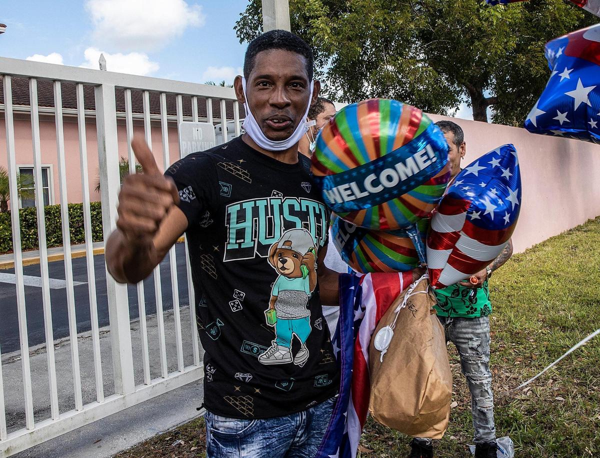Detainee Barbaro Alvarez Castro reacts after being released from the Broward Transitional Center in Pompano