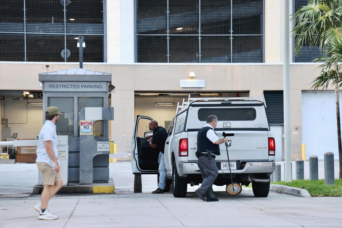 Security personnel screen vehicles at the north entrance security checkpoint of the Wilkie D. Ferguson Jr. U.S. Courthouse, Tuesday, June 13, 2023, in Miami, where former President Donald Trump will be arraigned Tuesday afternoon.