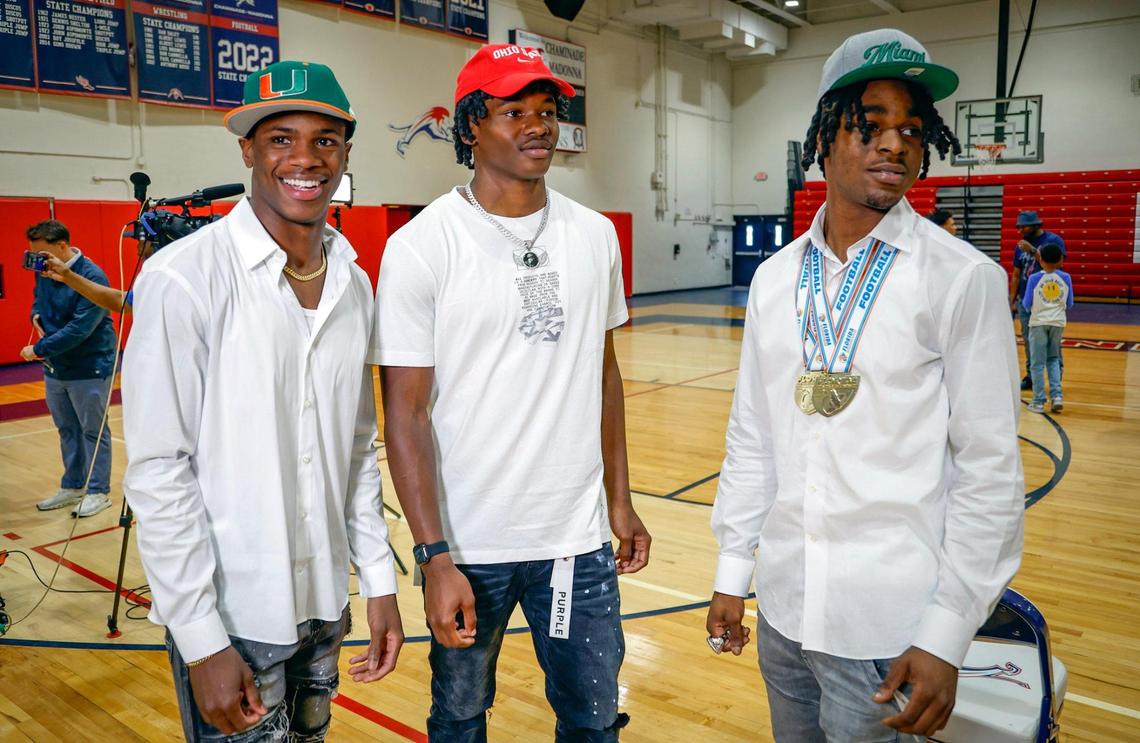 Joshisa Trader signed with the University of Miami, Jeremiah Smith signed with Ohio State, and Zaquan Patterson signed with the University of Miami during signing day at Chaminade-Madonna in Hollywood, Florida on Wednesday, December 20, 2023.