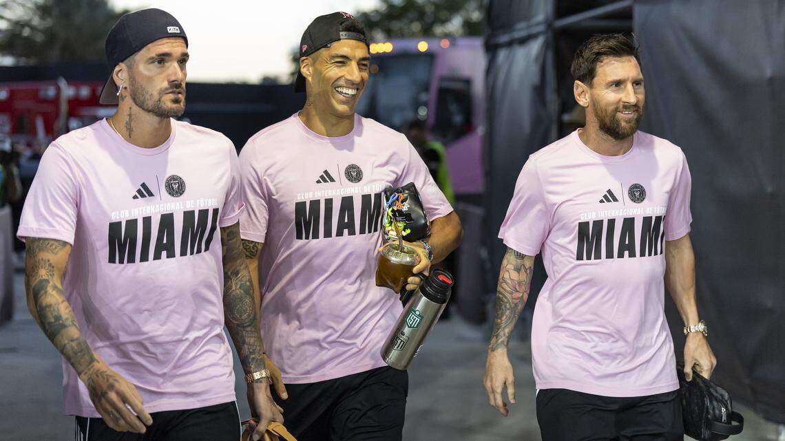 Inter Miami forwards Lionel Messi (10), Luis Suárez (9) and midfielder Rodrigo de Paul (7) arrive to Chase Stadium before playing against Nashville SC in match one of their MLS Playoffs series at Chase Stadium on Friday, Oct. 24, 2025, in Fort Lauderdale, Fla.