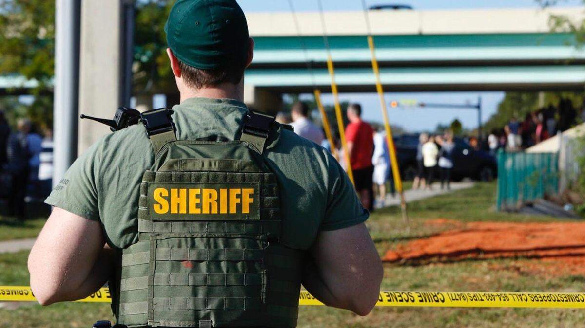 A Broward Sheriff’s Office deputy was part of the massive contingent of law officers deployed to Marjory Stoneman Douglas High School in Parkland, Florida, on Wednesday, Feb. 14, 2018, during the shooting spree by Nikolas Cruz.