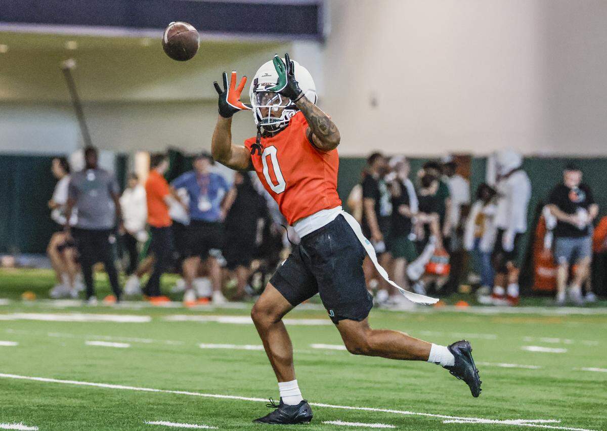 Miami Hurricanes defensive back Omar Thornton (0) catches a pass during practice drills at the Carol Soffer Indoor Practice Facility on the University of Miami campus in Coral Gables, Florida, on Thursday, March 26, 2026.