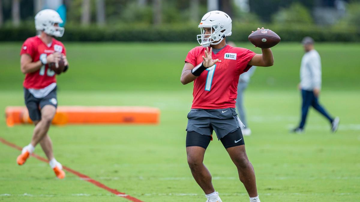 Miami Dolphins quarterback Tua Tagovailoa (1) throws the ball during a team practice session at the Baptist Health Training Complex on Wednesday, Oct. 19, 2022, in Miami Gardens, Fla.