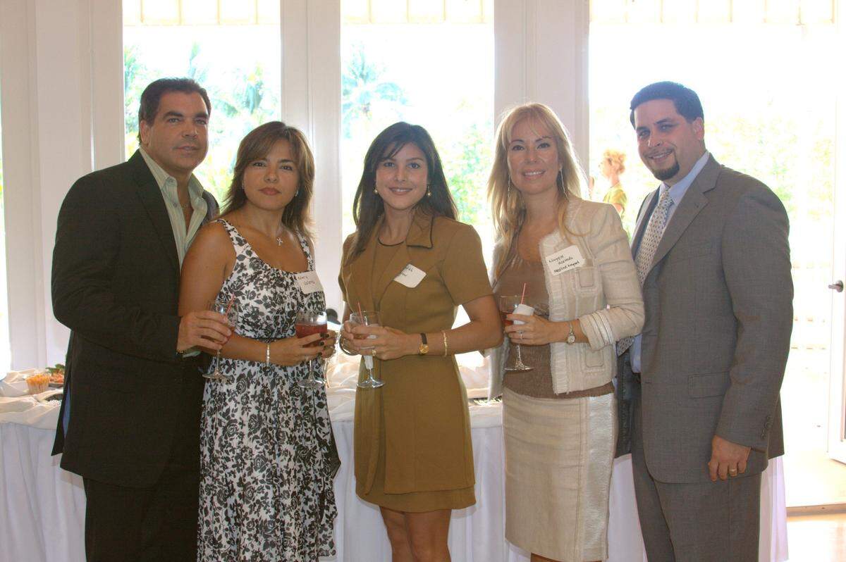 A photo filed in federal court shows the executives of American Therapeutic Corp. in Miami in 2009. From left: Lawrence Durán, Marinella Valera, Judith Negrón, Margarita Acevedo and José Valdés.