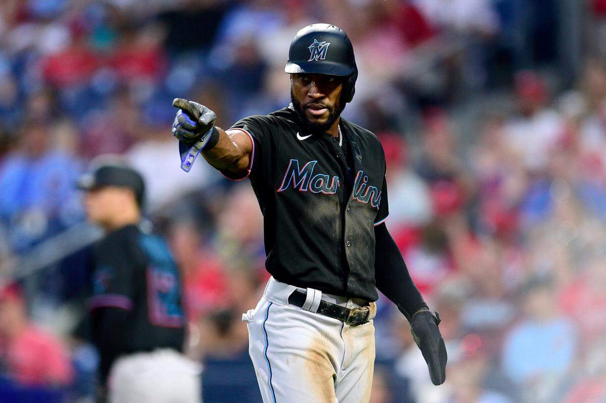 Miami Marlins’ Starling Marte gestures after scoring on a single by Jesus Aguilar during the third inning of the second baseball game of the team’s doubleheader against the Philadelphia Phillies, Friday, July 16, 2021, in Philadelphia. (AP Photo/Derik Hamilton)