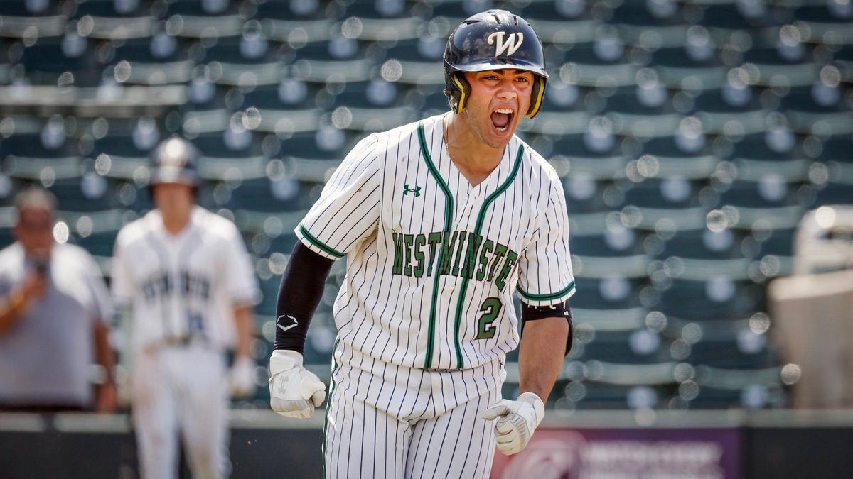 Westminster Christian School Warriors Jose Lopez (2) reacts while heading to first base on a walk and bringing in a runner to score in the sixth inning against the Jacksonville Trinity Christian Conquerors during the FHSAA Baseball Class 3A State Semifinal at Hammond Stadium in Fort Myers, Florida on on Tuesday, May 21, 2024.