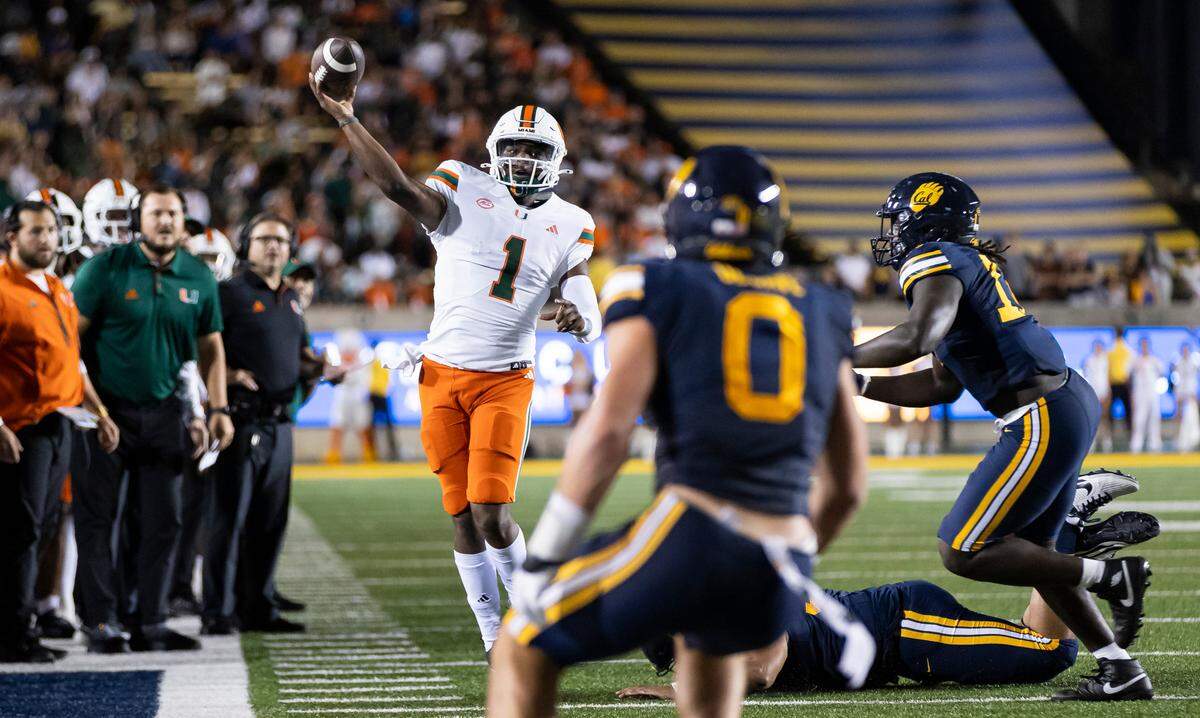 Miami Hurricanes quarterback Cam Ward (1) throws the ball in the second half of his NCAA college football game against the California Golden Bears at the California Memorial Stadium on Saturday, Oct. 5, 2024, in Berkeley, Calif.