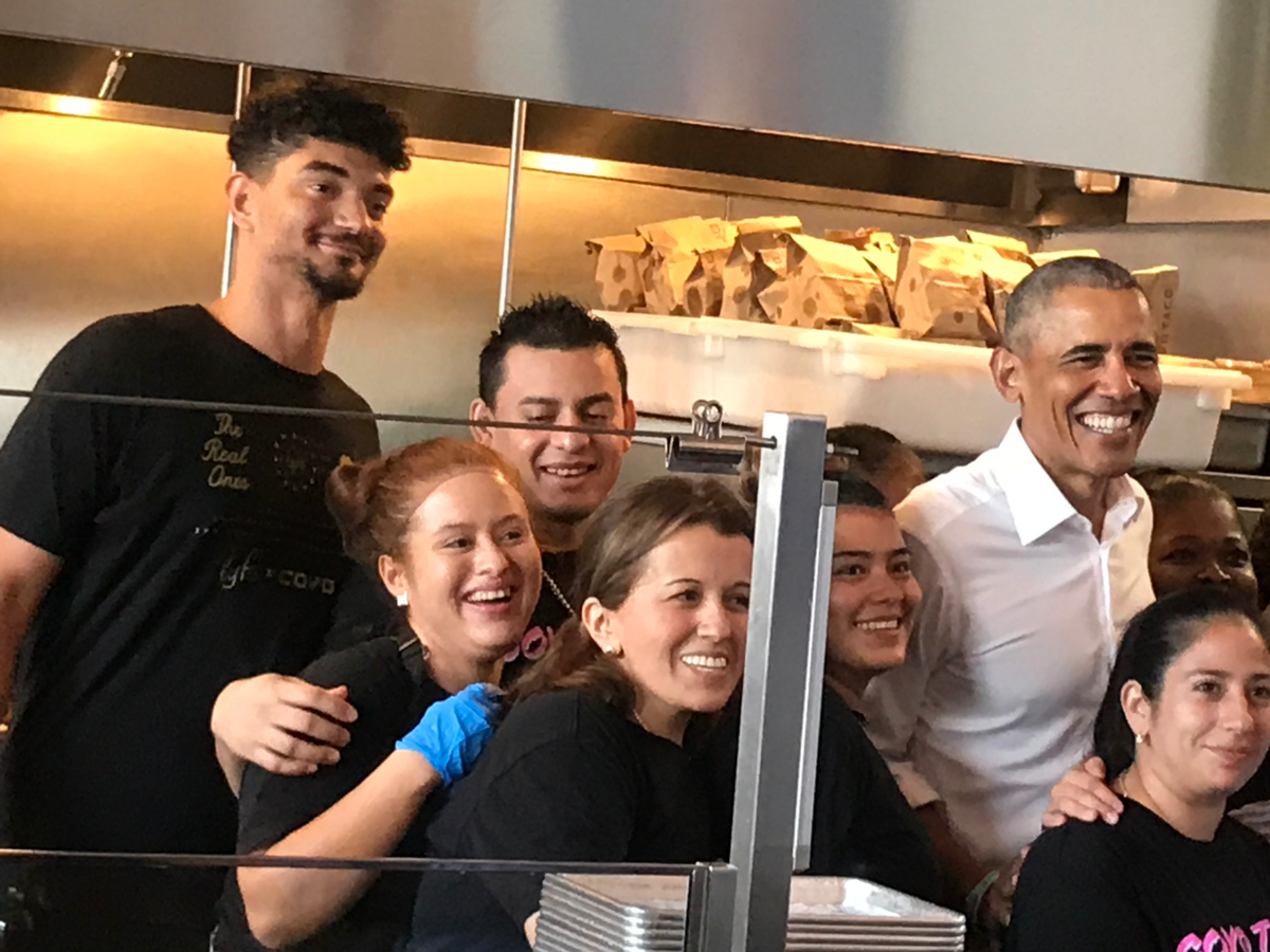 Former president Barack Obama poses with the staff at Coyo Taco in Wynwood in 2018.