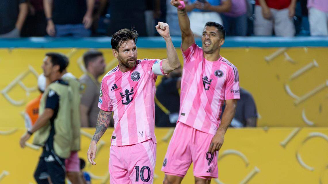 Inter Miami forward Luis Suárez (9) celebrates with teammate Lionel Messi (10) after scoring a goal against Palmeiras during the first half of their FIFA Club World Cup Group A third-round match at Hard Rock Stadium on Monday, June 23, 2025, in Miami Gardens, Fla..