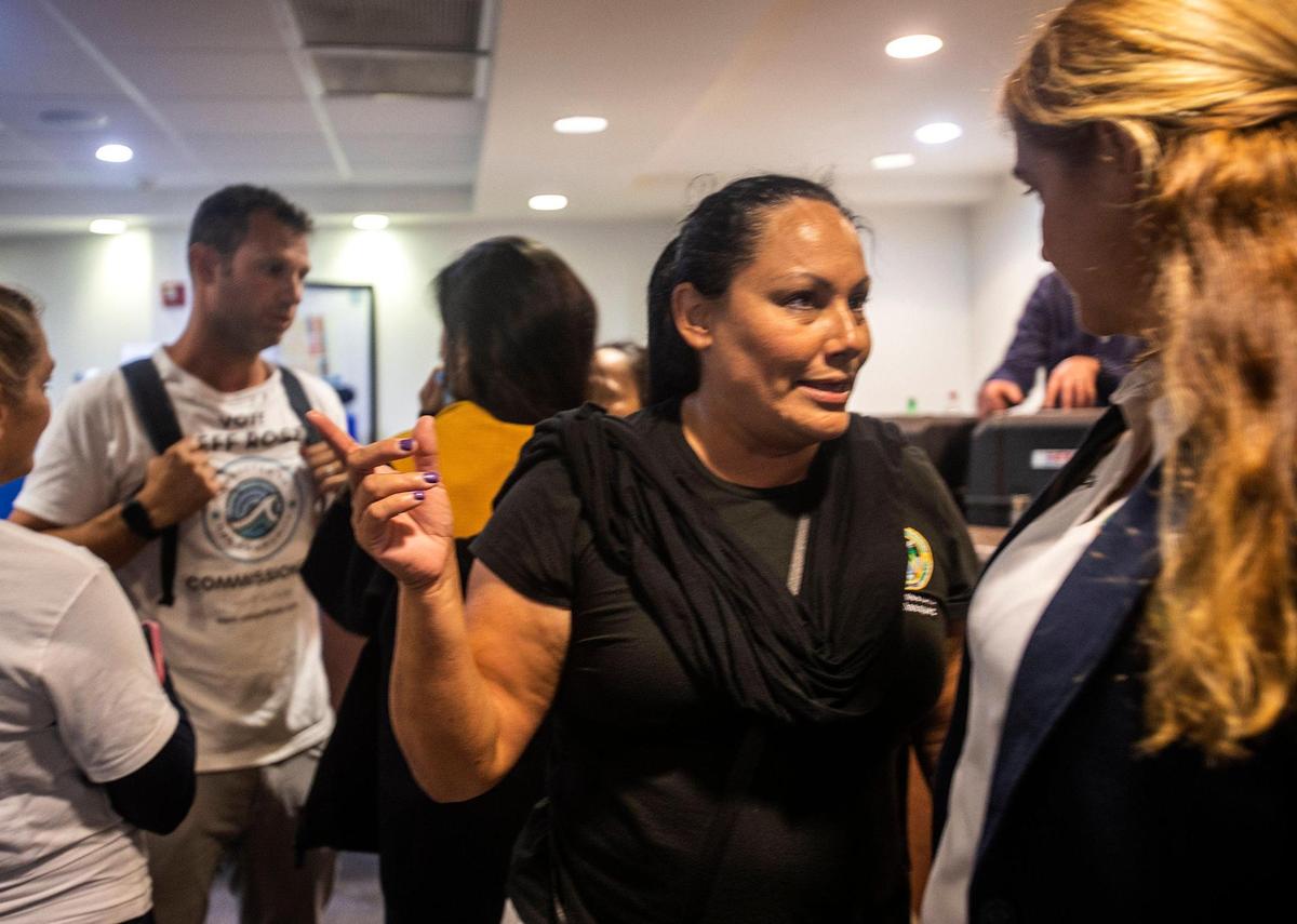 Surfside Commissioner Nelly Velazquez (left) chats with the City clerk Sandra McCready as Velasquez celebrates her re-election during at Town Hall on Tuesday March 15, 2022.