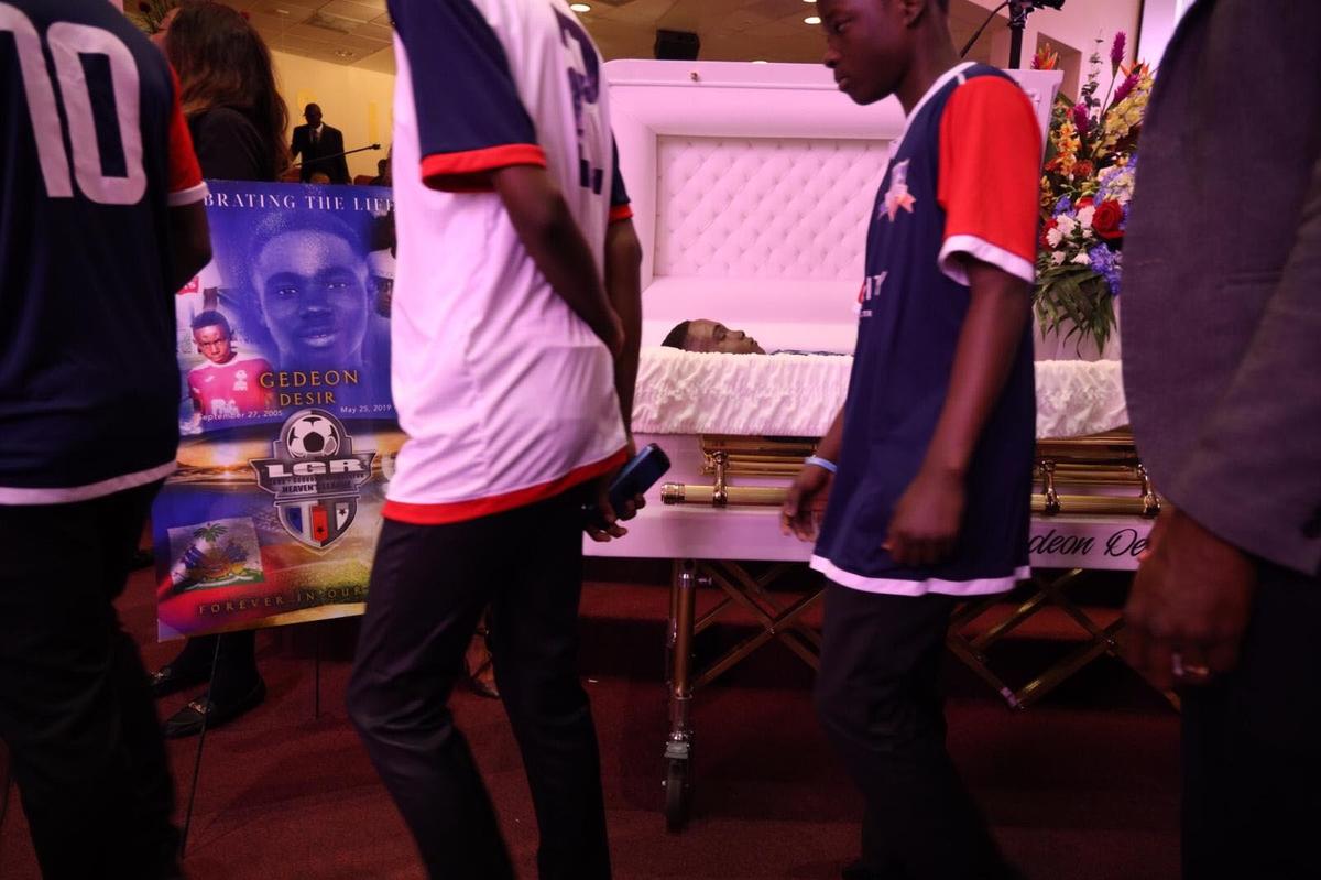 Mourners pay their respect to the three Haitian teens killed by a motorist during the memorial service at 93rd Community Baptist Church on Saturday, June 22, 2019.