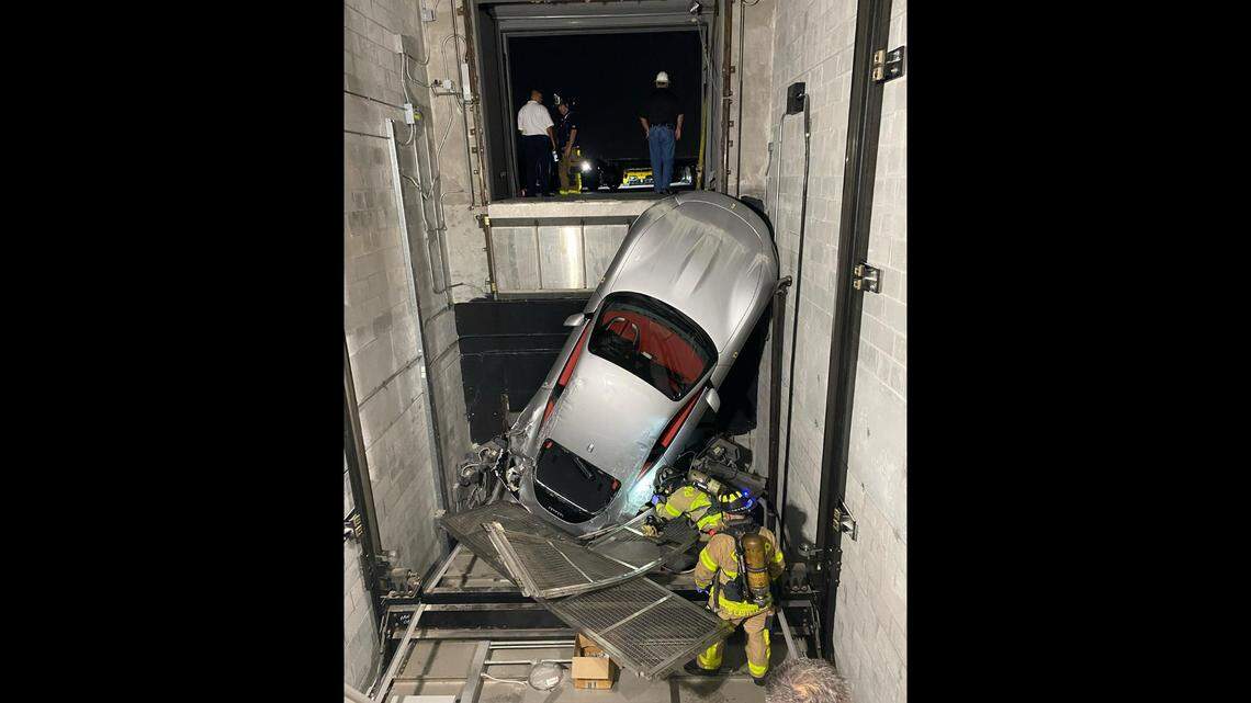 A Ferrari ended up vertical in a shaft after the elevator malfunctioned at a Florida dealership, according to Palm Beach County Fire Rescue.