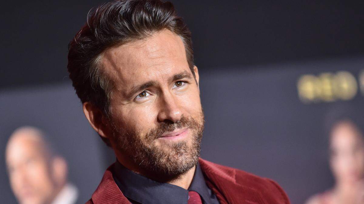 Ryan Reynolds at a red carpet event.