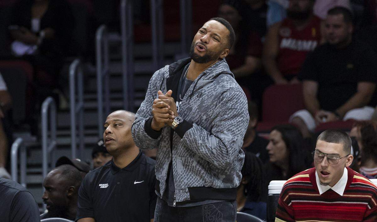 Miami Heat guard Norman Powell (24) reacts after a play against the Charlotte Hornets in the first half of their NBA game at Kaseya Center on Oct. 28, 2025, in Miami.