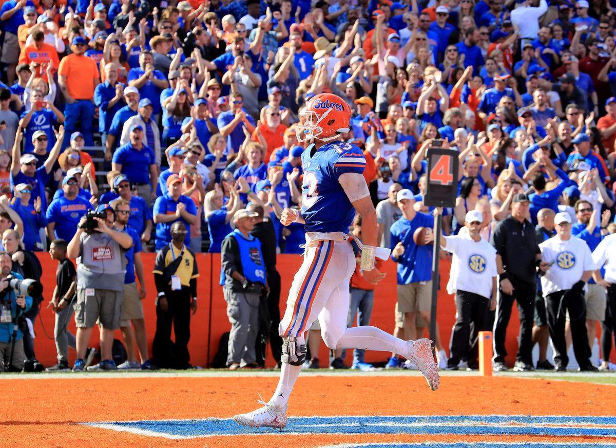 Florida Gators quarterback Feleipe Franks crosses the goal line for a touchdown during the game against the South Carolina Gamecocks at Ben Hill Griffin Stadium on Nov. 10, 2018 in Gainesville.