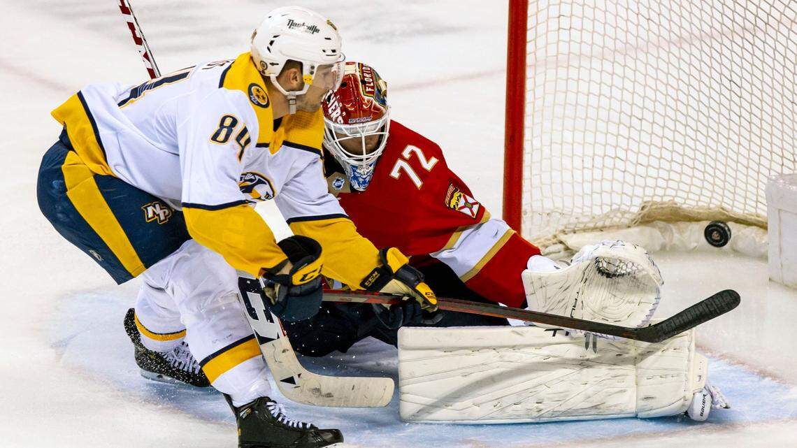 Nashville Predators left wing Tanner Jeannot (84) scores on Florida Panthers goalie Sergei Bobrovsky (72) during the third period of an NHL game at FLA Live Arena in Sunrise, Florida, on Tuesday, February 22, 2022.