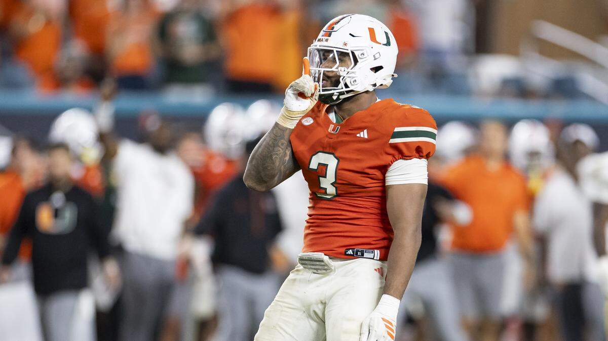 Miami Hurricanes defensive lineman Akheem Mesidor (3) reacts after he sacked Notre Dame Fighting Irish quarterback CJ Carr (13) in the second half of their NCAA football game at Hard Rock Stadium on Sunday, Aug. 31, 2025, in Miami Gardens, Fla.