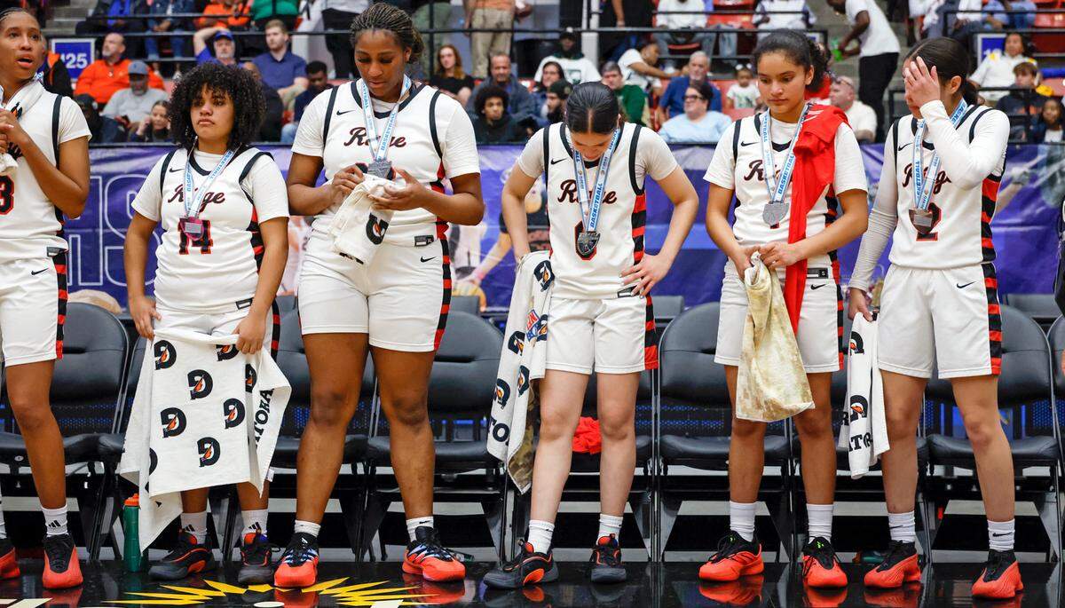 Southridge Spartans’ Emily Jean-Glaude (3), Joann Barnes (14), Zharianna Guion (33), Naya Hardisson (0), Sakura Barnes (1), and Dianka Hardisson (2). left to right, react after being defeated by Bloomingdale for the FHSAA Class 6A Girls High School Basketball State Championship.