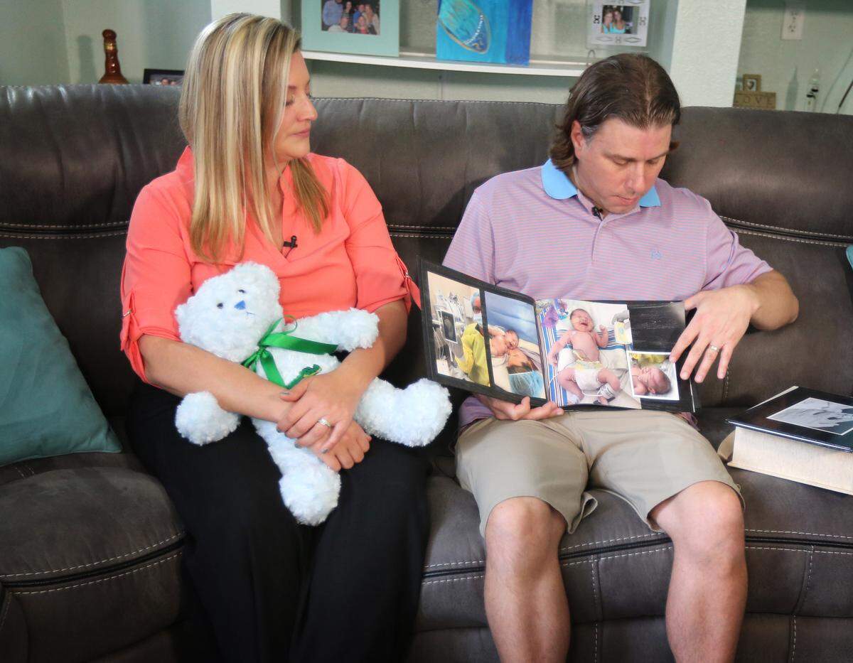 James Johnson, here with his wife, Lindsey, did not want their son to die alone. So he held the boy as medical staff slid the breathing tube from Cooper’s throat. Cooper’s heart beat on for about 15 minutes. Then, it stopped.