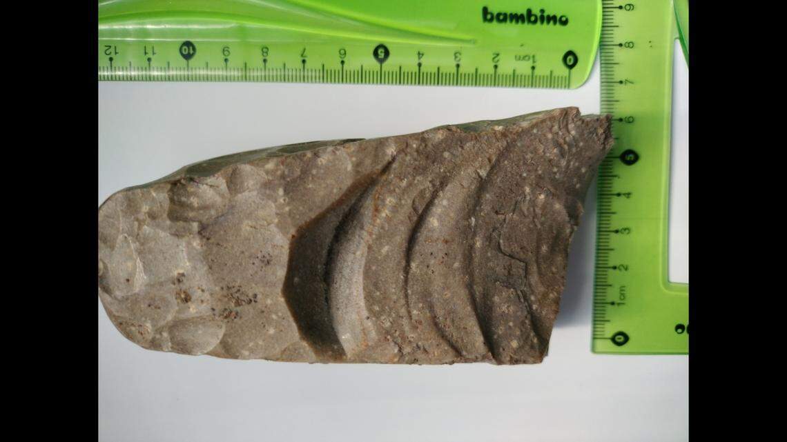 The ax fragment dates to sometime between 1900 B.C. and 1500 B.C., according to experts.