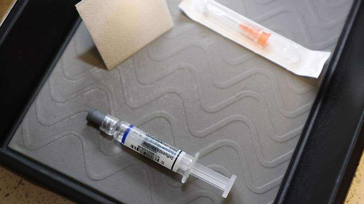 CORAL GABLES, FLORIDA - SEPTEMBER 15: An Influenza Vaccine is prepared for a patient at Doctor Gary M. Kramer, MD, PA's Pediatric office on September 15, 2025, in Coral Gables, Florida. The Florida Department of Health recently released information on the development of rulemaking to revise immunization and document requirements for school entry. (Photo by Joe Raedle/Getty Images)