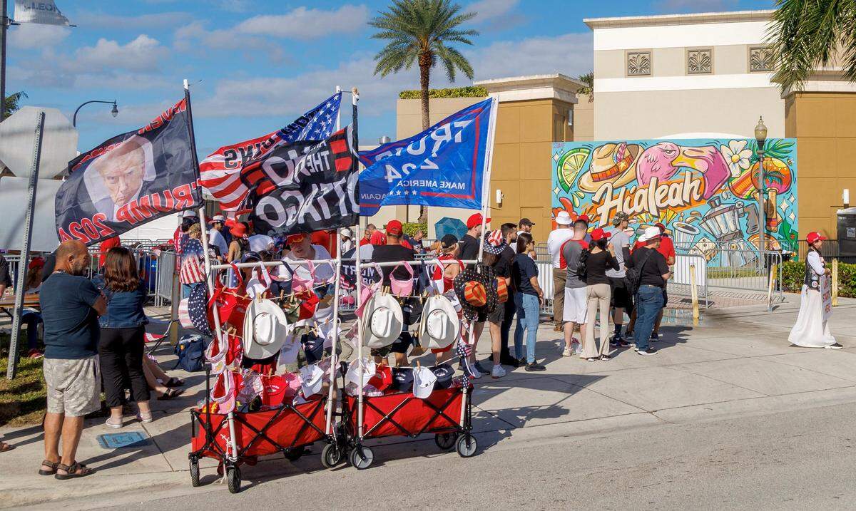 Former President Donald Trump supporters lined up early morning for his late night appearance at the Ted Hendricks Stadium at Henry Milander Park in Hialeah.