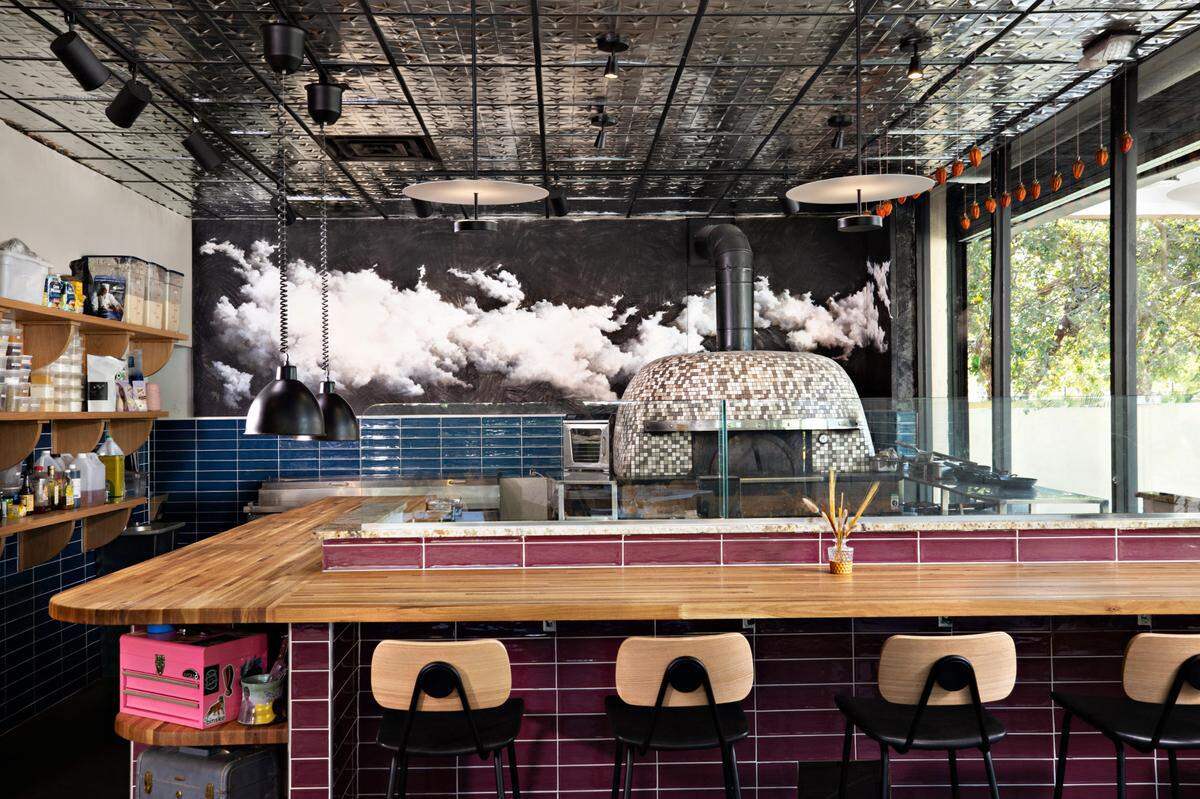 The wood-fired oven at Walrus Rodeo is not just for pizza — it’s the centerpiece of Jeff Maxfield’s menu.