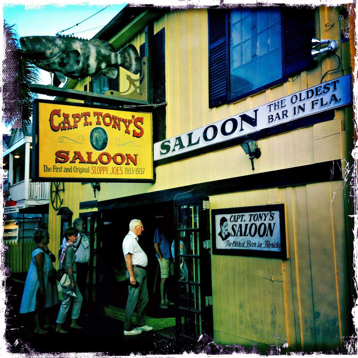 Tourist stop by the historic Captain’s Saloon, the original Hemingway bar, in Key West captured with Hipstamatic. The Captain’s Saloon was owned by David Wolkowsky’s father and was given to him as a inheritance and is one of the reasons that Wolkowsky returned back to Key West.
