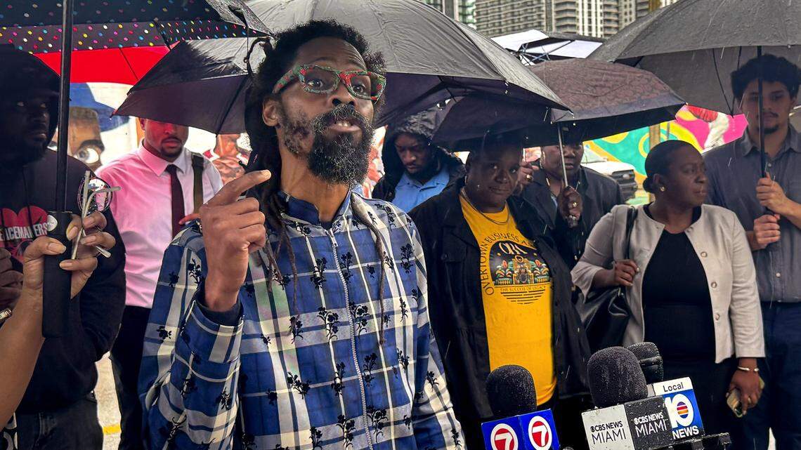 Terrance Cribbs-Lorrant, left, director of Miami’s Black Police Precinct and Courthouse Museum, addresses the racial epithets and swastika that defaced the mural of Jackie Robinson at Dorsey Park in Miami, Florida., Tuesday, June 3, 2025.
