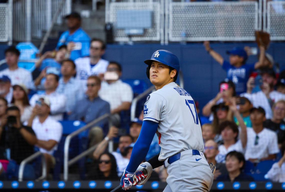 Los Angeles Dodgers designated hitter Shohei Ohtani (17) looks up at his hit during the sixth inning of a game against the Miami Marlins on Wednesday, May 7, 2025, at loanDepot Park in Miami, Fla.