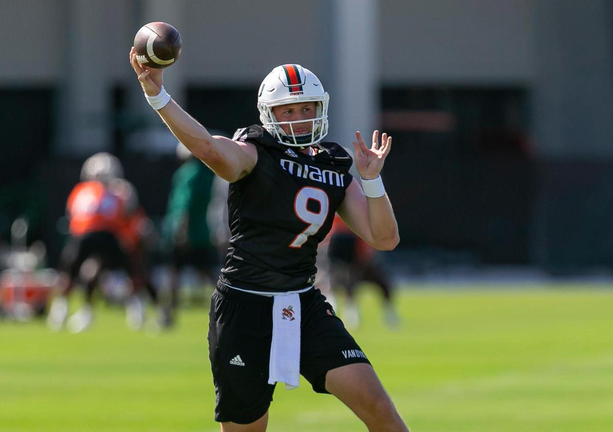 Miami Hurricanes quarterback Tyler Van Dyke (9) runs practice drills with his team at the University of Miami’s Greentree Practice Fields in Coral Gables, Florida on Monday, March 7, 2022.