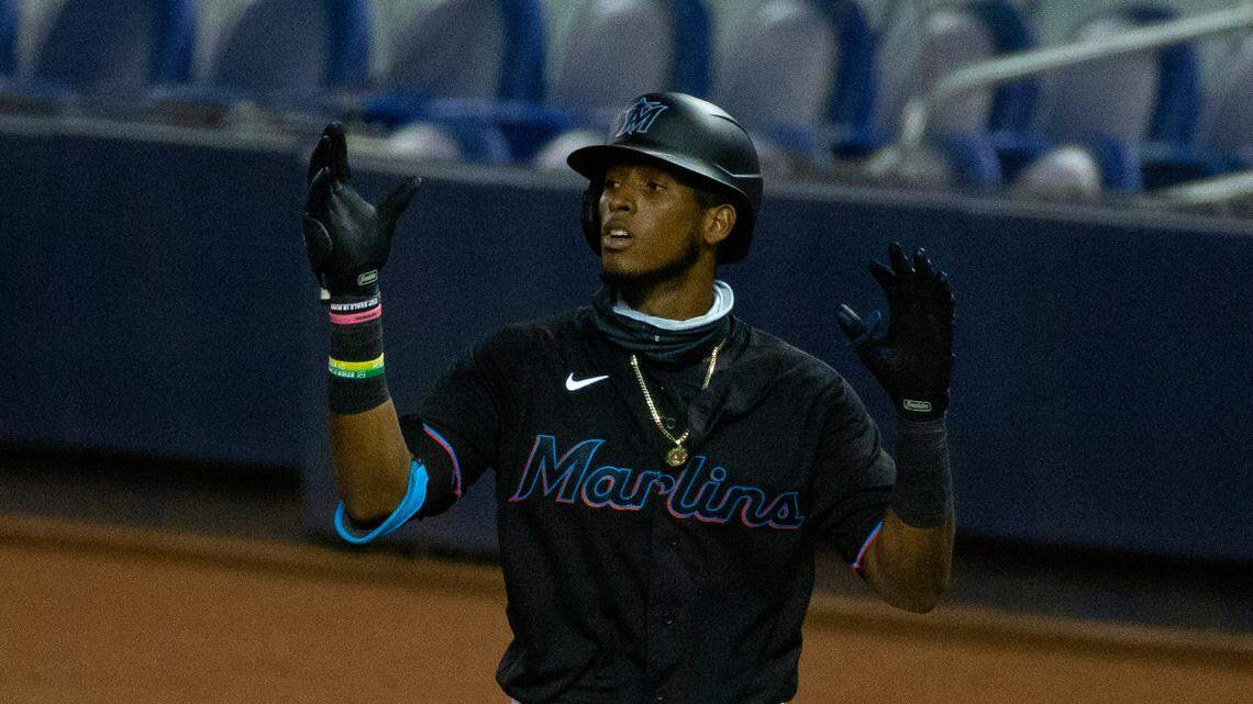 Miami Marlins infielder Lewin Diaz (68) reacts after hitting a single during the ninth inning of a Major League Baseball game against the Atlanta Braves at Marlins Park in Miami on Saturday, August 15, 2020.
