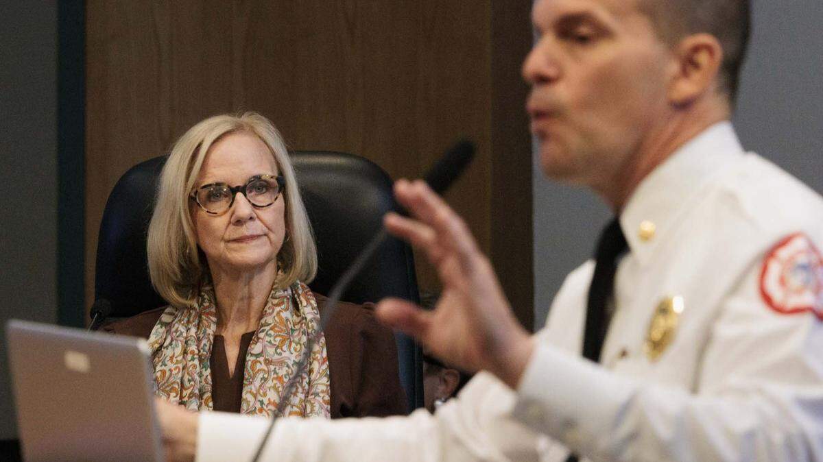 Mayor Eileen Higgins listens to Fire Chief Robert Hevia give a presentation on fire stations that need updates and areas that could use a fire station due to poor response times during a Miami City Commission meeting on Thursday, May 14, 2026, at Miami City Hall in Miami, Fla. Mayor Higgins' $450 million bond for police and fire stations was discussed.
