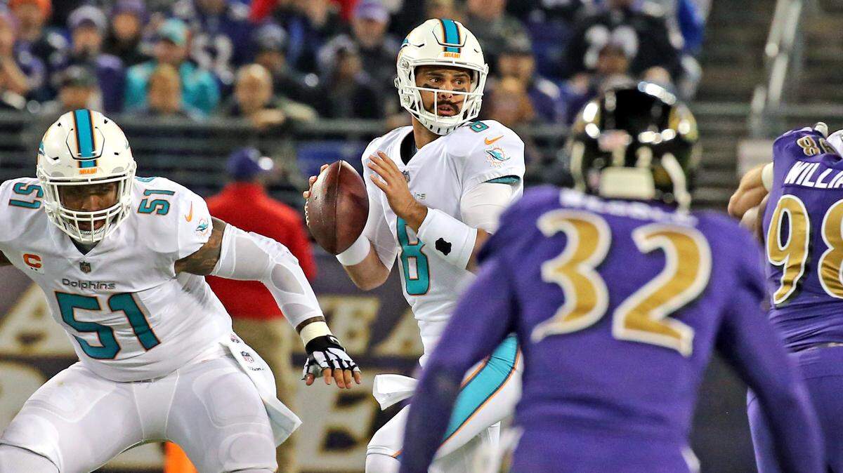 Miami Dolphins quarterback Matt Moore prepares to throw the ball in the first quarter as they play the Baltimore Ravens at the M&T Bank Stadium in Baltimore, Maryland, Oct. 26, 2017.